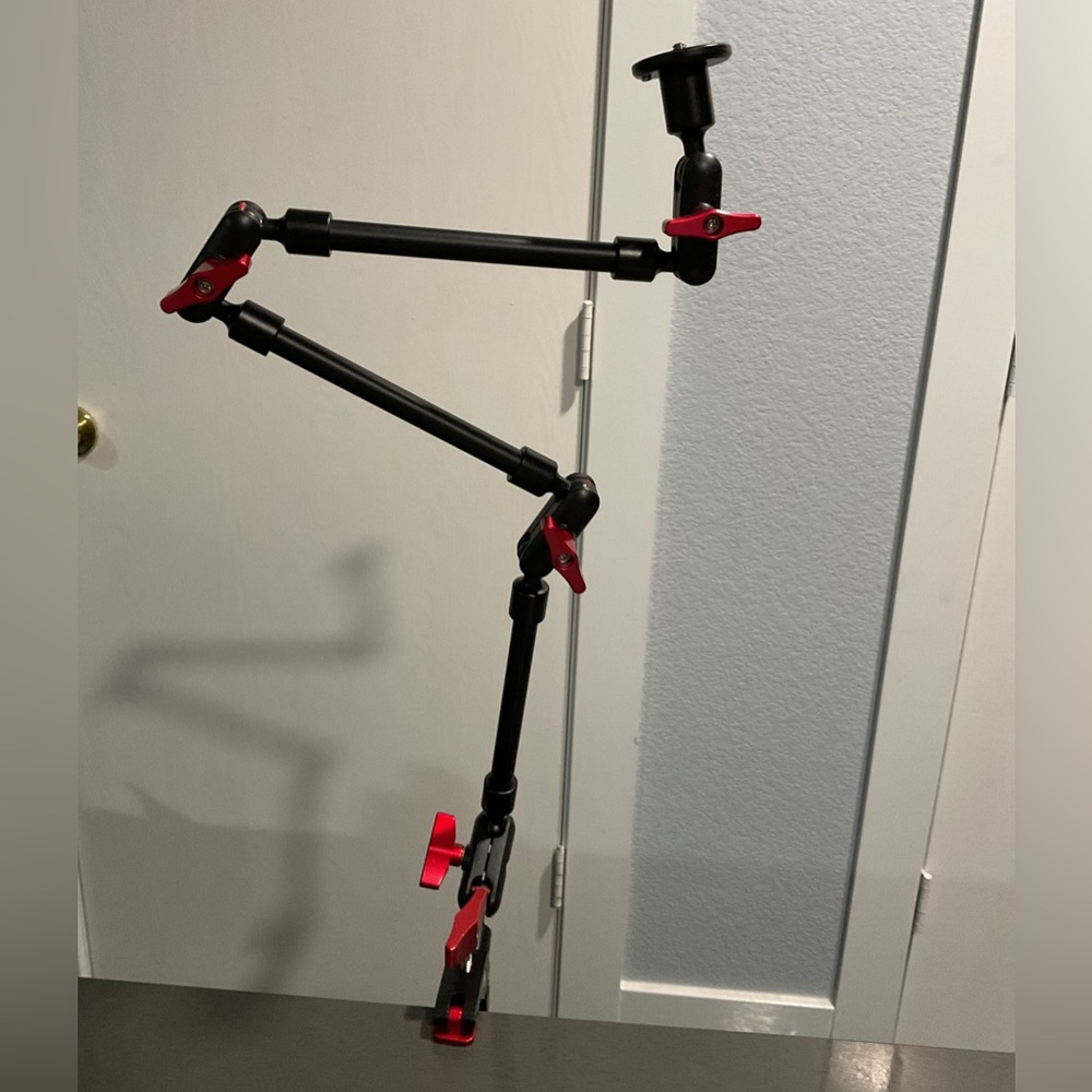 Adjustable Black and Red Universal Mounting Arm & Clamp